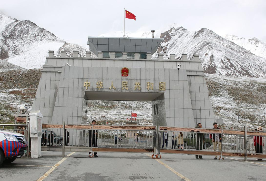 A Chinese border gate stands at the Khunjerab Pass, a region where some of the country’s Uyghur population lives. The Chinese government continues to oppress its citizens, including Uyghurs, outside the country Credit: John Sawar/Shutterstock