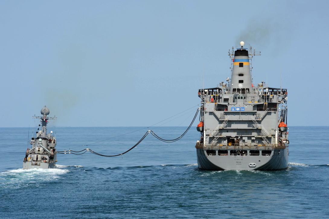 The Military Sealift Command fleet replenishment oiler USNS Pecos (T-AO 197), right, performs a replenishment-at-sea with the South Korean Patrol Combat Corvette Puchon (PCC 773) in the Yellow Sea during exercise Foal Eagle 2013 on March 15, 2013. Ships from the U.S. 7th Fleet and the Republic of Korea are underway for exercise Foal Eagle 2013 in support of regional security and stability of the Asia-Pacific region. (DoD photo by Petty Officer 3rd Class Declan Barnes, U.S. Navy.