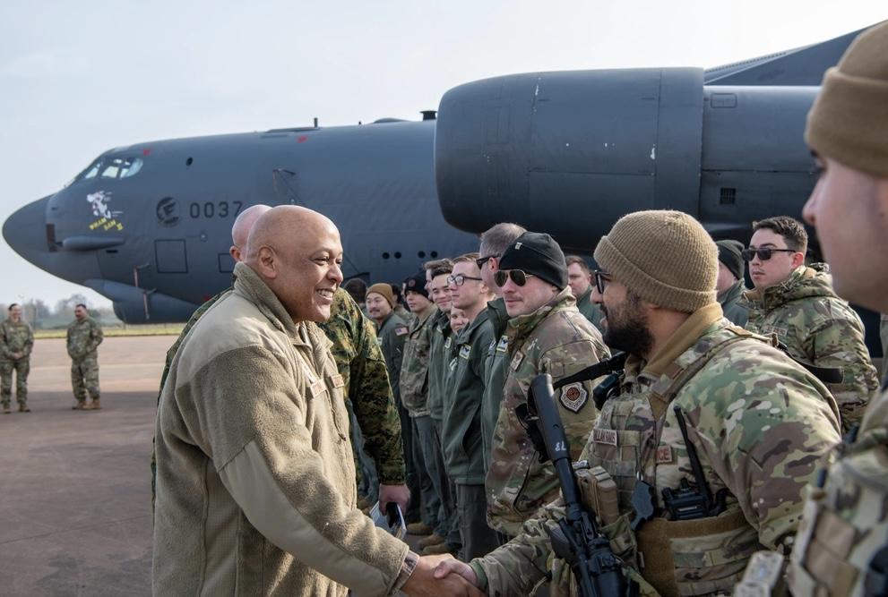 U.S. Air Force Gen. Anthony J. Cotton, U.S. Strategic Command (STRATCOM) commander, shakes hands with a member of the 69th Expeditionary Bomb Squadron during a tour on RAF Fairford, England, in February.  STRATCOM has a global mission that includes joint electromagnetic spectrum operations. The National Strategic Research Institute explores key areas to aid STRATCOM’s future needs. Credit: U.S. Air Force photo by Tech. Sgt. Jessica Avallone