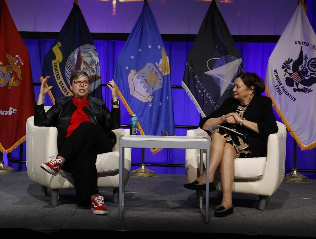 Jane Rathbun (l) sits with Lt. Gen. Susan Lawrence, USA (RET.), AFCEA International president and chief executive officer, for a fireside chat at the 2024 AFCEA West conference in San Diego. Credit: Michael Carpenter/Jesse Karras.  