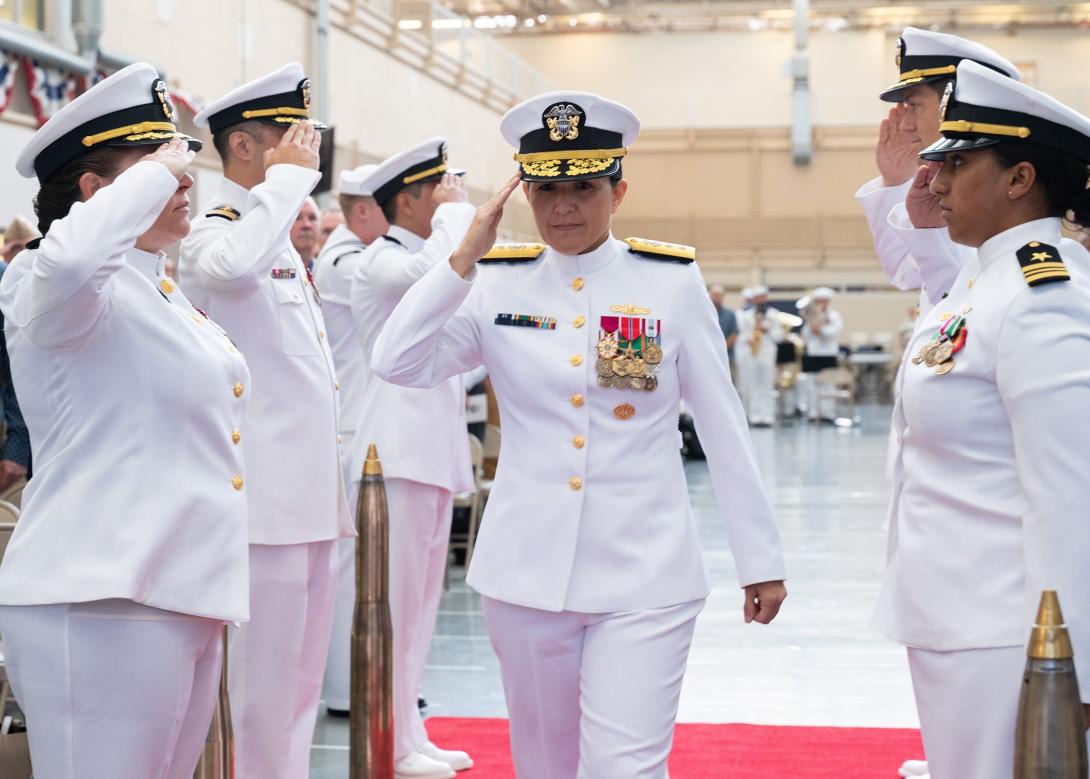 Now-Vice Adm. Seiko Okano, commander, Naval Information Warfare Systems Command (NAVWAR), salutes the sideboys during the Tactical Networks Program Office (PMW 160) change of command ceremony August 29, 2024. Credit: U.S. Navy photo by Ramon Go