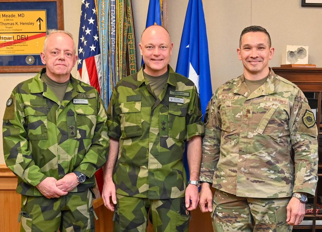 U.S. Air Force Lt. Gen. Thomas Hensley, commander, 16th Air Force, Air Forces Cyber and Joint Force Headquarters (Air Force), Joint Base San Antonio-Lackland, Texas, stands with Swedish Navy (Marines) Maj. Gen. Rikard Askstedt (left), the Swedish Embassy Defense Attaché, and Swedish Armed Forces Maj. Gen. Johan Pekkari (middle), during a February 2024 visit at Joint Base San Antonio-Lackland, Texas. 16th Air Force is working to harmonize defensive cyber. Credit: U.S. Air Force photo by Deirdre McNamara