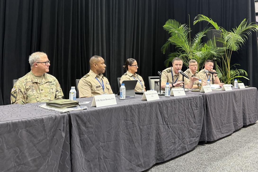 Lt. Col. Adam Brinkman, director of the G6 in the 25th Infantry Division, speaks at TechNet Indo-Pacific 2025 in Honolulu.