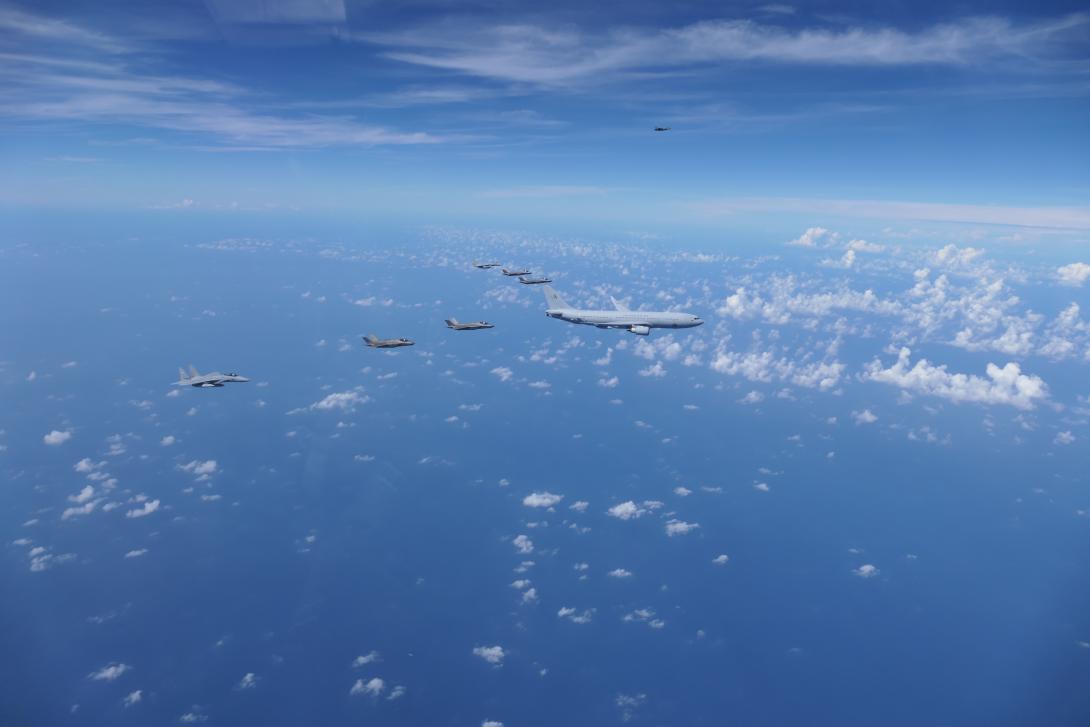 A Royal Australian Air Force (RAAF) KC-30, two U.S. Air Force F-35s, two RAAF F-35s and two Japan Air Self-Defense Force F-15Js fly in formation over the Pacific Ocean prior to the start of Exercise Bushido Guardian 25 near Misawa Air Base, Japan, September 26, 2025. International exercises and training, long held for the air, and sea domains, are expanding to include space domain elements, key for a resilient future, an Australian leader says. Credit: U.S. Air Force 35th Fighter Wing Courtesy Photo