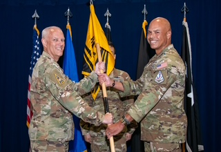 USSF Lt. Gen. Philip Garrant, SSC commander, presides over the assumption of command ceremony at which USSF Col. A.J. Ashby assumes command of SYD 88 at Los Angeles Air Force Base on September 12, 2025. SYD 88 supports the SSC’s Military Communications and Positioning, Navigation and Timing Program Executive Office. Credit: U.S. Space Force photo by Van Ha