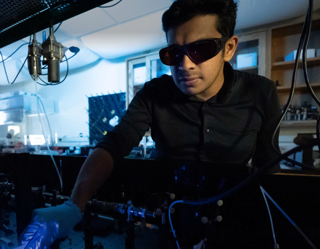 University of Southern California Ph.D. student Thabassum Nattikallungal sets up an experiment to resolve the spin-state dynamics in intramolecular charge transfer compounds. The U.S. National Science Foundation and the United Kingdom Research and Innovation have joined forces on a $10 million effort to fund eight projects researching chemistry and quantum information science. Credit: Thabassum Nattikallungal/University of Southern California