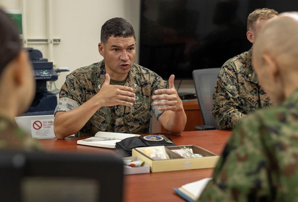 U.S. Marine Corps Col. Joshua Mayoral, commanding officer of III Marine Expeditionary Force Information Group, delivers a brief during Resolute Dragon 25 at Camp Courtney, Okinawa, Japan, September 16, 2025. A two government programs have opened for cyber and information technology professionals to grow their abilities in different organizations such as the U.S. Marine Corps Forces Cyber Command. U.S. Marine Corps photo by Cpl. Juan Maldonado