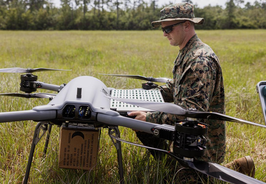 U.S. Marine Corps Lance Cpl. Quinn Stillman, a small unmanned aerial system operator with Combat Logistics Regiment 2, 2nd Marine Logistics Group, changes the battery on a TRV150 unmanned aerial system during a tactical demonstration. With the Lift Challenge, the Defense Advanced Research Projects Agency intends to dramatically increase small drone payload capabilities. Lance Cpl. Hunter Kuester/U.S. Marine Corps