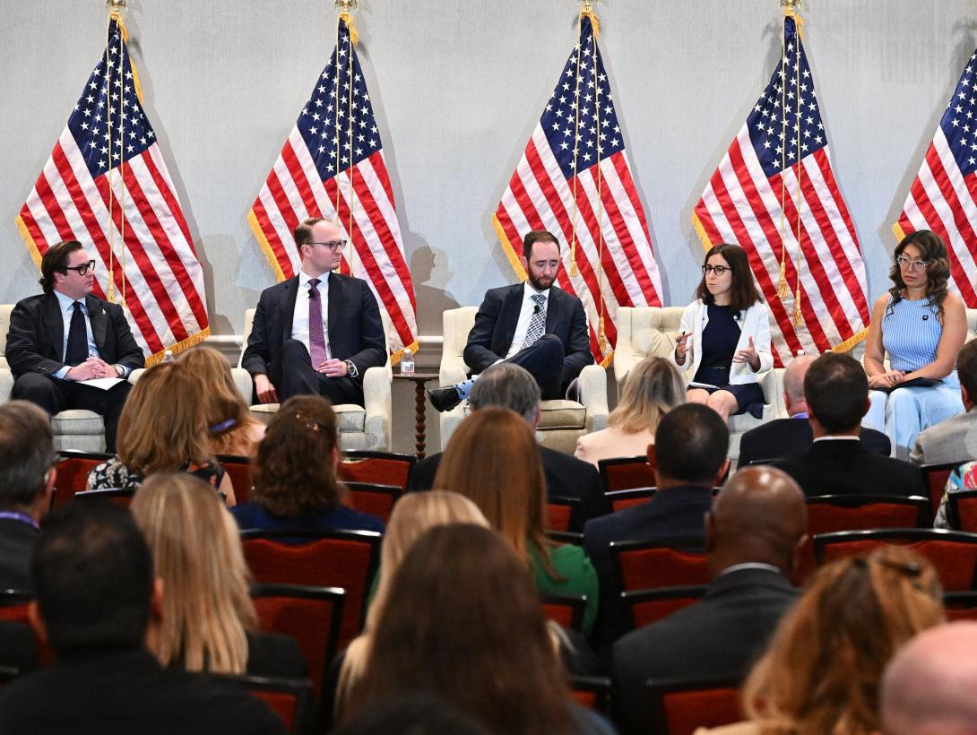 Intelligence professionals explain the threats that may arise in the post-quantum cryptography era at the Intelligence & National Security Summit on August 26, 2026. Credit: Herman Farrer Photography