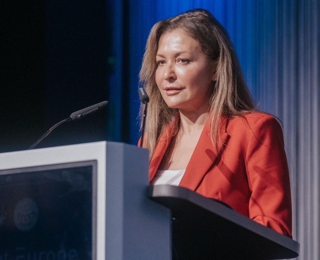 Talitha Born, program director of the Defense Open in Order (DOO) and director for Enterprise Governance in the Ministry of Defense of the Netherlands, gives a keynote address at TechNet Europe in Berlin. Credit: Robin Wulff