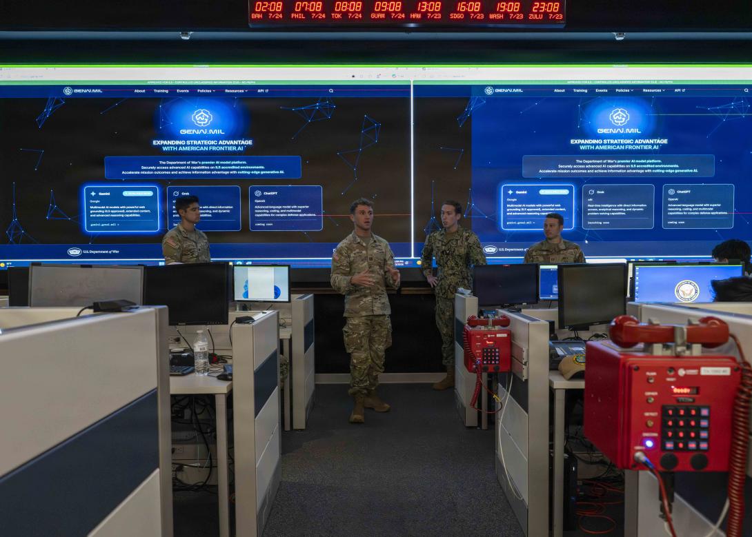 Services members assigned to the GenAI.mil task force, Department of War (DoW) Chief Digital and Artificial Intelligence Office (CDAO), deliver training on building AI agents to Sailors assigned to U.S. Pacific Fleet on Joint Base Pearl Harbor-Hickam, Hawaii, July 23, 2026. Under the purview of the DoW CDAO, the Task Force is helping to systematically remove barriers to AI adoption to ensure a more lethal Department of War. (U.S Navy photo by Mass Communication Specialist 2nd Class Christopher Sypert)