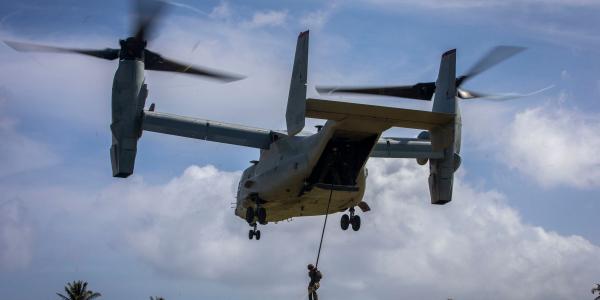 A U.S. Marine with 2nd Battalion, 3rd Marine Regiment, fast ropes from a MV-22B Osprey during drills in November at Marine Corps Base Hawaii. Technologies fielded by the service’s Command Element Systems must be lightweight and effective for expeditionary forces.  U.S. Marine Corps photo by Cpl. Matthew Kirk, USMC