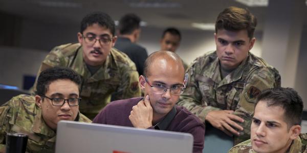 U.S. Cyber Command cyber warriors and a French cyber professional collaborate during a July 21 training exercise, Cyber Fort III, at Fort George G. Meade, Maryland. The Command, along with federal agencies such as the FBI, NSA, DOD and the Department of Justice, will be collaborating with the new Joint Cyber Defense Collaborative to broaden U.S. cyber defenses. Credit: U.S. Cyber Command/Josef Cole