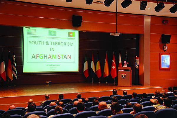 A lecturer at the NATO Centre of Excellence Defence Against Terrorism (COE DAT) in Ankara, Turkey, provides counterterrorism training for NATO personnel deploying to Afghanistan. The center, which is run by eight NATO nations, now is expanding its mission area to include terrorist exploitation of cyberspace.