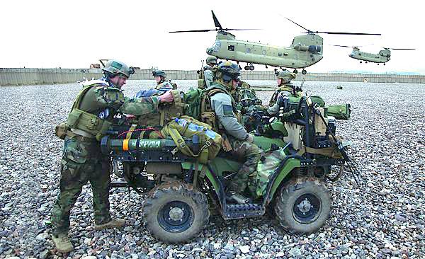 MARSOC Marines, above, prepare to board CH-47 Chinook helicopters as part of a two-day presence patrol with Afghan Commandos in Farah province.