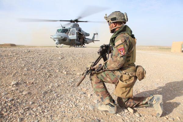 A Marine with U.S. Marine Corps Forces, Special Operations Command provides security at a landing zone in Nahr-e Saraj district, Helmand Province March 28.