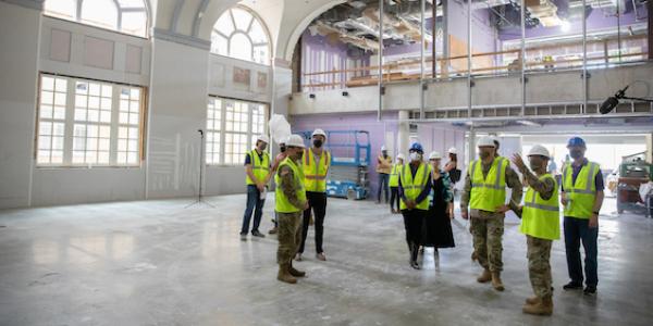 Members of AFC and ACC tour the future facilities of the Software Factory. Credit: ACC