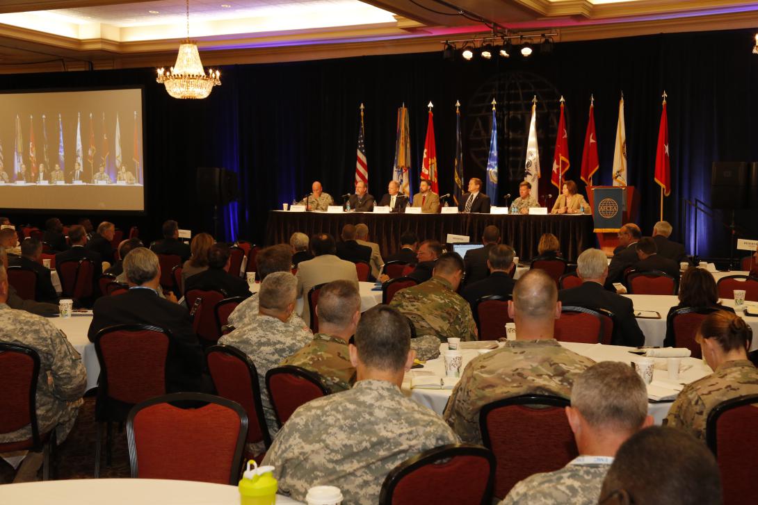 Attendees list as industry panelists present thoughts on the military's effort to streamline cybersecurity efforts at AFCEA International's TechNet Augusta conference in Georgia. Photo by Mike Carpenter