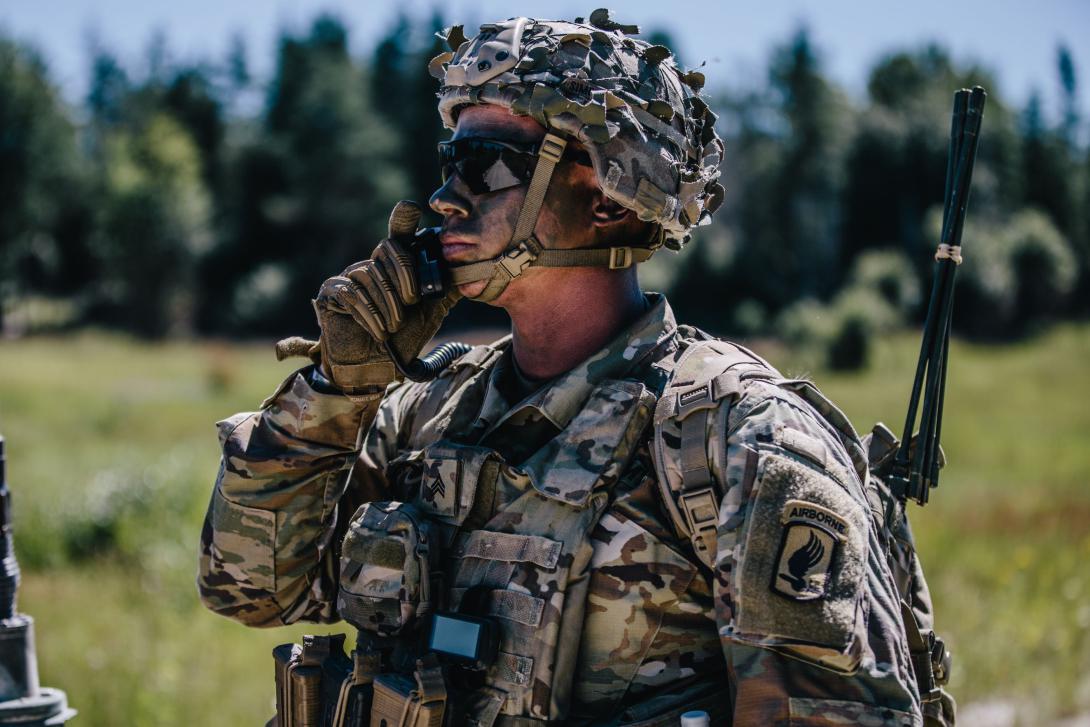 A U.S. Army paratrooper coordinates firing positions during a live-fire exercise in Germany. DISA is working to speed cloud capabilities to the warfighter for better situational awareness at the tactical edge. U.S. Army photo