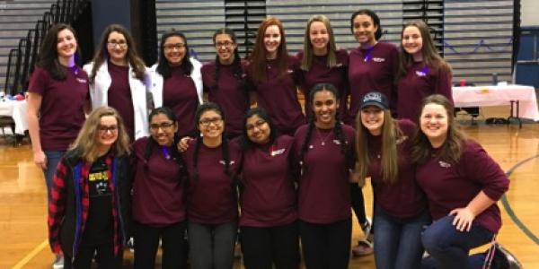 Students from Frank Scott Bunnell High School in Stratford, Connecticut, who formed a Girls in STEM group, gather during their Make-Her Fair event, which aims to get young girls excited about science and technology.