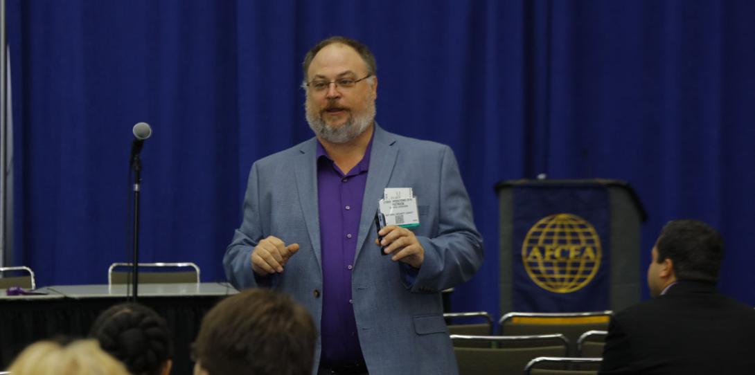 Patrick Arvidson, special assistant to the office of the National Manager for National Security Systems, NSA, speaks at the AFCEA Defensive Cyber Operations Symposium.