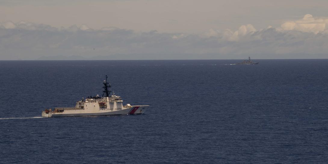 A U.S. Coast Guard cutter and a U.S. Navy Arleigh Burke-class destroyer patrol the Hawaiian Island operational area. All three sea services are modernizing amid budget constraints. Credit: MC2 Christian M. Huntington, USN