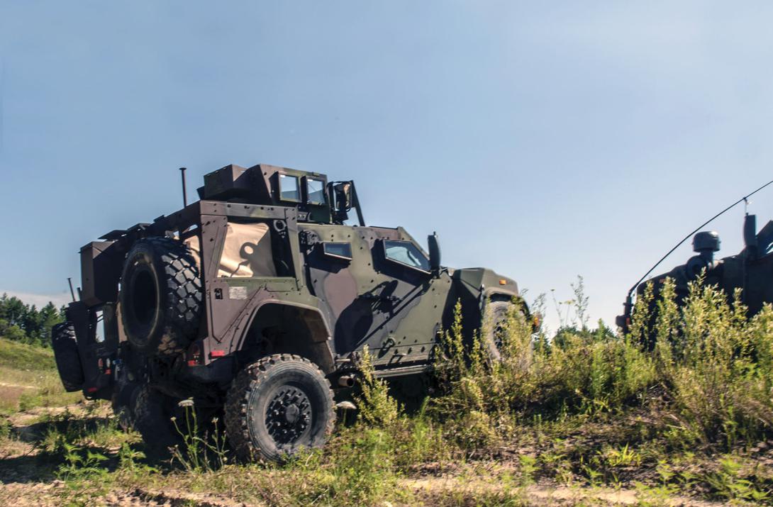A Joint Light Tactical Vehicle engages its independent suspension to a level stop over uneven terrain. Credit: Sgt. Manuel Quiros, USAR