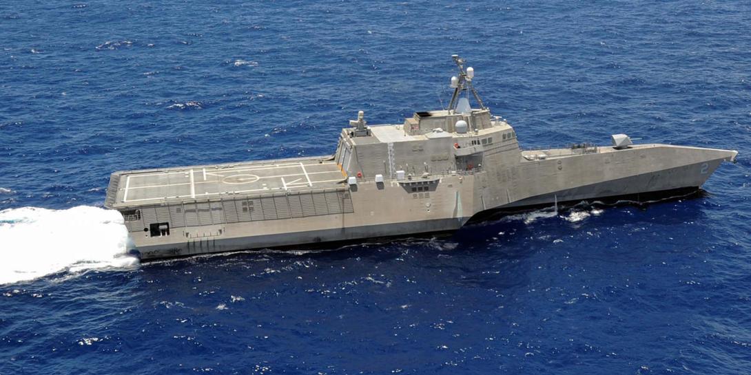 The U.S. Navy’s USS Independence, LCS-2 (r) looks similar to a new Chinese littoral combat ship, or C-LCS, shown in the prior photo. China has introduced new classes of catamarans and trimarans for coastal operations. 