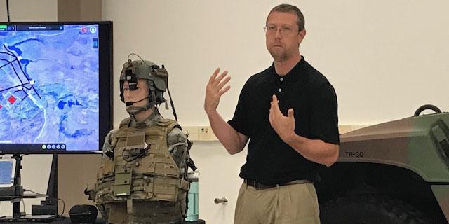 Lead Engineer Dan Lenhardt of the Communications-Electronics Research, Development and Engineering Center (CERDEC) explains the new speech recognition platform that the center developed to facilitate hands-free computer interaction for soldiers on the move.
