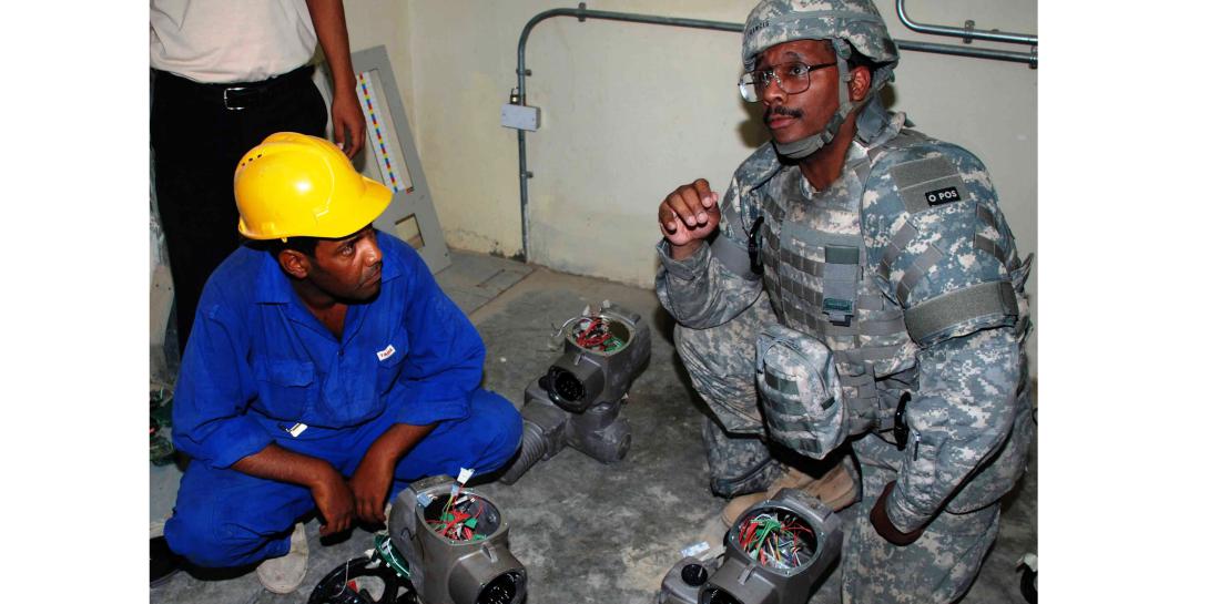 A member of the Army Corps of Engineers examines filter actuators at a water treatment plant in Baghdad. With a presence in more than 20 countries worldwide, the Corps is modernizing its infostructure to maintain connectivity with minimum downtime and maximum operational options.  U.S. Army Corps of Engineers photo
