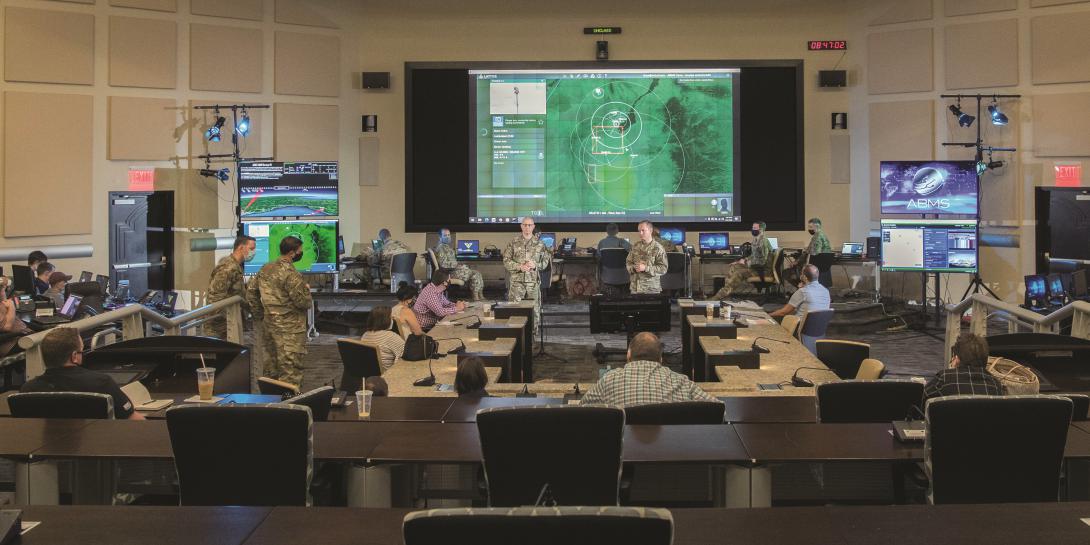 U.S. Air Force Airmen speak with reporters on the new innovative Advanced Battle Management System (ABMS) Onramp 2 in September at Joint Base Andrews, Maryland. ABMS is the digital infrastructure which allows a level of connectivity and sensor compatibility for military at war.  Photo by Senior Airman Daniel Hernandez, 1st Combat Camera Squadron