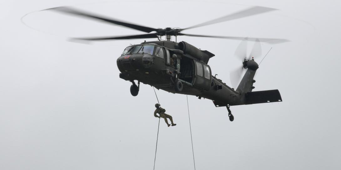 Soldiers rappel from an Army UH-60 Black Hawk helicopter during an air assault course at Grafenwoehr Training Area, Germany, September 16, 2021. An artificial intelligence system that provides biofeedback for rotary wing aircraft pilots won the fifth iteration of the XVIII Airborne Corps Dragon’s Lair competition. Photo by Markus Rauchenberger, U.S. Army 