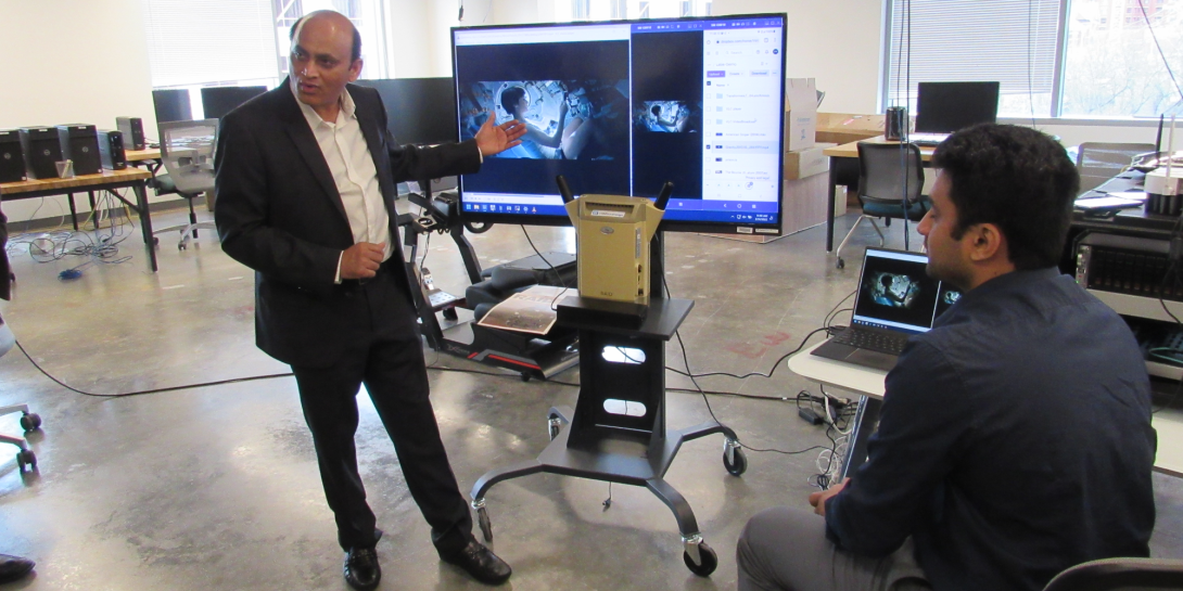 Mohan Tammisetti, senior vice president and COMSovereign’s chief engineer, demonstrates a prototype of the company’s portable, compact, easily deployable standalone communications system at the Commonwealth Cyber Initiative Living Innovation Lab at George Mason University. The standalone 5G wireless network hardware, available as a backpack or housed within a durable Pelican case, is powerful enough to keep an entire city’s secure communication needs up and running.