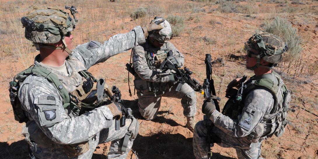 After receiving coordinates on the Nett Warrior system, U.S. soldiers from the 35th Infantry Regiment, 1st Armored Division, prepare to move out during a Network Integration Evaluation exercise.