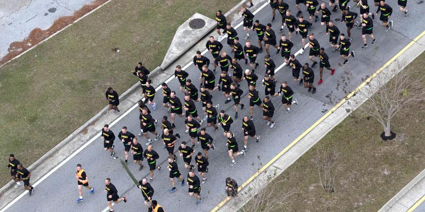 Army soldiers from the 3rd Infantry Division participate in a 4-mile division run at Fort Stewart, Georgia. The use of fitness trackers by some soldiers is inadvertently revealing their location and outline of military bases. Army photo by Sgt. Caitlyn Smoyer