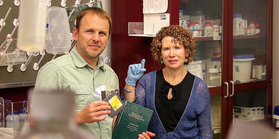 Sandia scientists Marlene and George Bachand show off their new method for encrypting and storing sensitive information in DNA. Digital data storage degrades and can become obsolete, and old-school books and paper require lots of space. (Photo by Lonnie Anderson)