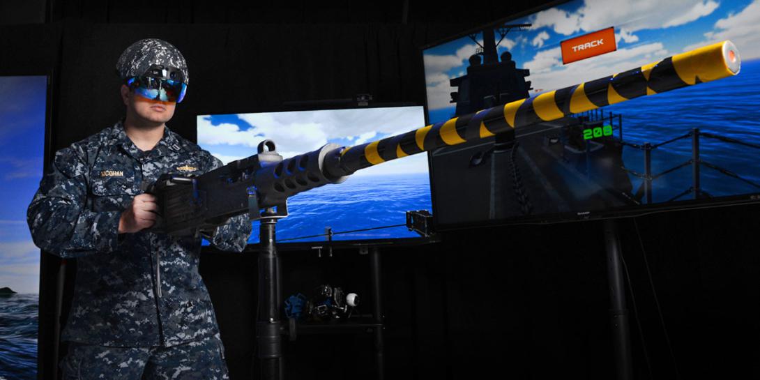 Lt. Steven McGhan, USN, demonstrates a gun-augmented reality system at Trident Warrior 2017. In support of the Navy’s Optimized Fleet Response Plan, the Naval Information Warfighting Development Center (NIWDC) uses live, virtual and constructive training capabilities like these to effectively train the fleet. Navy photo by Alan Antczak