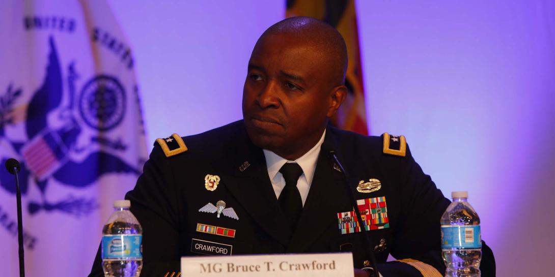  Maj. Gen. Bruce Crawford, USA, commanding general of the U.S. Army Communications-Electronics Command, speaks at MILCOM 2016. Photo by Mike Carpenter