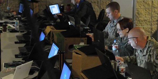 Members of the Army National Guard, Air National Guard, Army Reserve and civilian agencies prepare to engage in cyber attacks as part of the recent Cyber Shield 17 exercise at Camp Williams, Utah. The cyberthreat’s borderless nature is bringing together experts from several nations at this year's Department of Defense Intelligence Information System (DoDIIS) Worldwide Conference in St. Louis. 