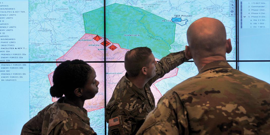 Soldiers demonstrate the Command Post Computing Environment prototype at Aberdeen Proving Ground. With a new single tactical server infrastructure plus a common software baseline, it will provide soldiers an underlying core command post system. U.S. Army photo by Dan Lafontaine, PEO C3T