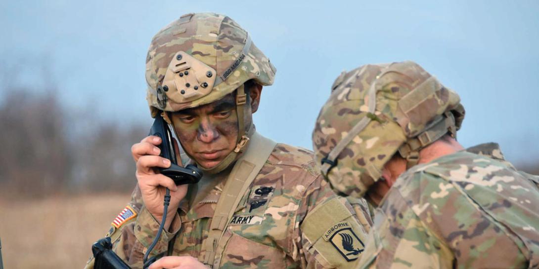 U.S. soldiers conduct a communications check during an exercise. The Army is implementing a plan for restructuring its battlespace network after years of ad hoc changes in Southwest Asia. Army photography by Lt. Col. John Hall, USA.