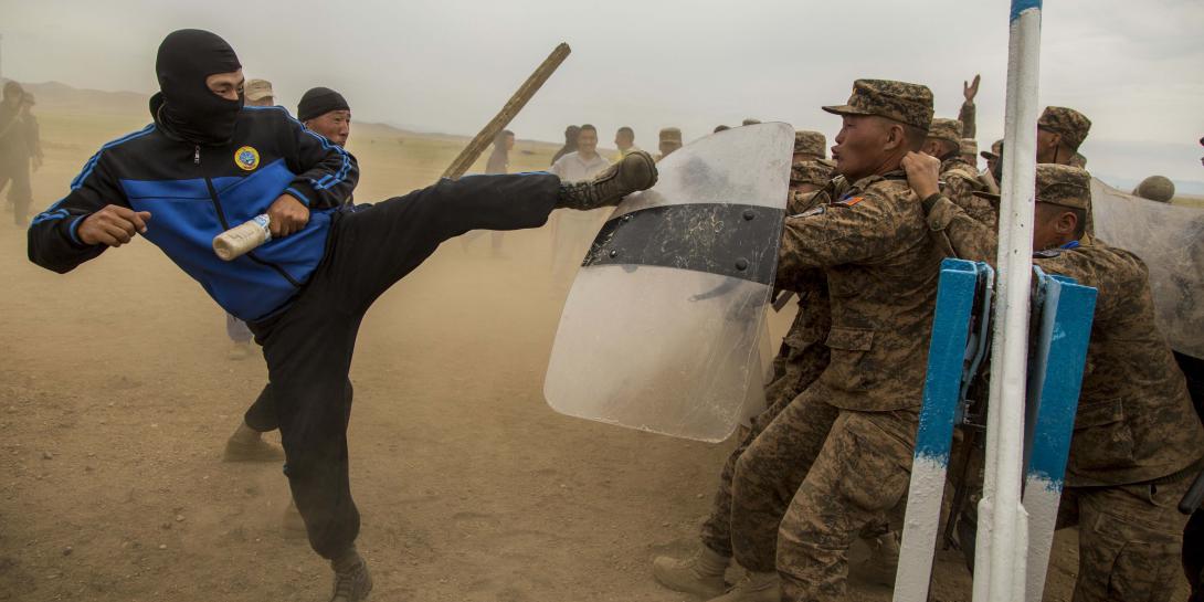Mongolian troops participate in a riot-control exercise during Khaan Quest 2015 in Tavan Tolgoi, Mongolia. The Intelligence Advanced Research Projects Activity’s predictive analytics programs seek to improve forecasting for a variety of events, including civil unrest and political uprisings.