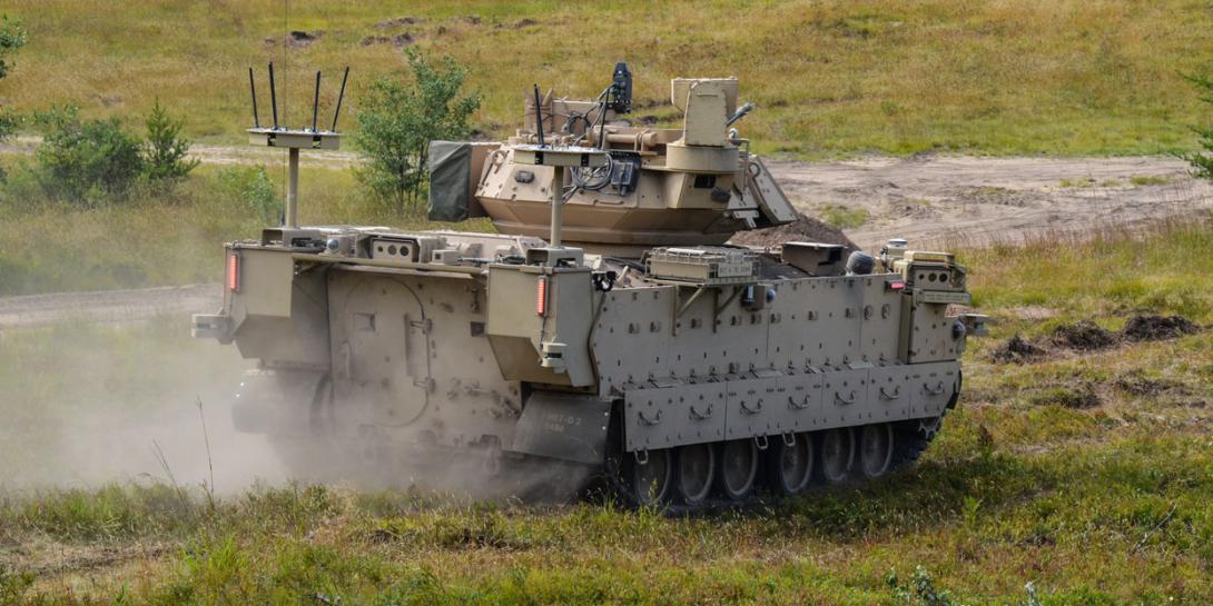 The Mission Enabling Technologies Demonstrator manned vehicle can operate two unmanned platforms to make contact with the enemy before soldiers do, while achieving overmatch against future operating environment threats. The Army’s vision includes three robotic vehicle variants—light, medium and large, but service officials have decided for now to cancel the acquisition of a medium variant. U.S. Army photo by Jerome Aliotta/Released 