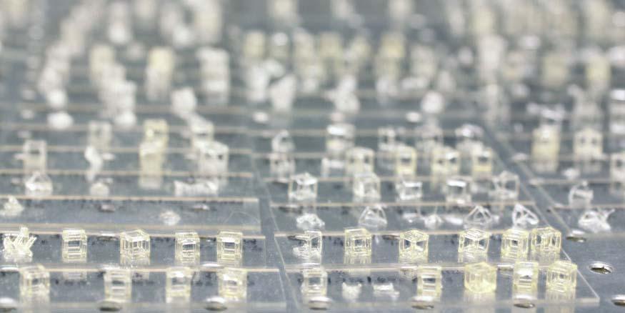 By using laser-generated, hologram-like 3-D images flashed into photosensitive resin, researchers can build complex parts in a fraction of the time of traditional layer-by-layer printing. Credit: Lawrence Livermore National Laboratory