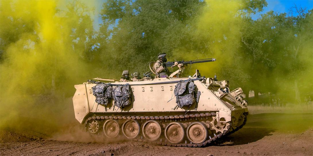 Soldiers travel in an M113 armored personnel carrier during a combat support training exercise. The Army keeps purchases and stores for long periods components of major systems, such as transmissions for M113s, but advances in manufacturing could help the service, and the industrial base, find new ways of sustaining heavy equipment. Credit: Master Sgt. Michel Sauret