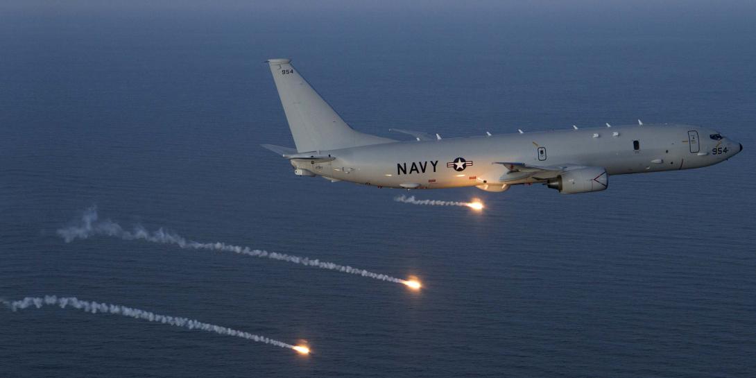 A P-8A Poseidon test aircraft completes a flare launch during a countermeasures test over the Atlantic Test Range. The P-8A participates in the Defense Exportability Features program, which is intended to identify exportability issues early in a system’s development, saving time and money in the future.