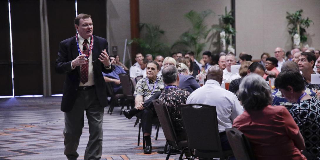 Terry Halvorsen, U.S. Defense Department chief information officer, addresses the crowd at AFCEA TechNet Asia-Pacific. Photo by Bob Goodwin