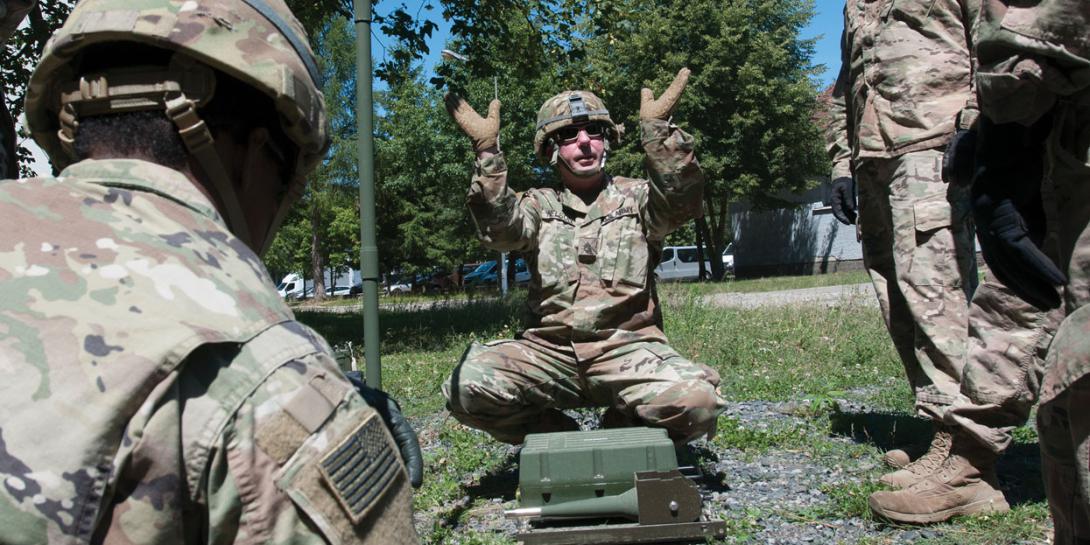 Staff Sgt. David Nelson, USA, a signal support systems specialist assigned to 218th Maneuver Enhancement Brigade in support of Resolute Castle 2018, explains near vertical incidence skywave antenna theory to members of Company B, 151st Expeditionary Signal Battalion during a high frequency radio class. Credit: Sgt. 1st Class Kimberly D. Calkins, ANG