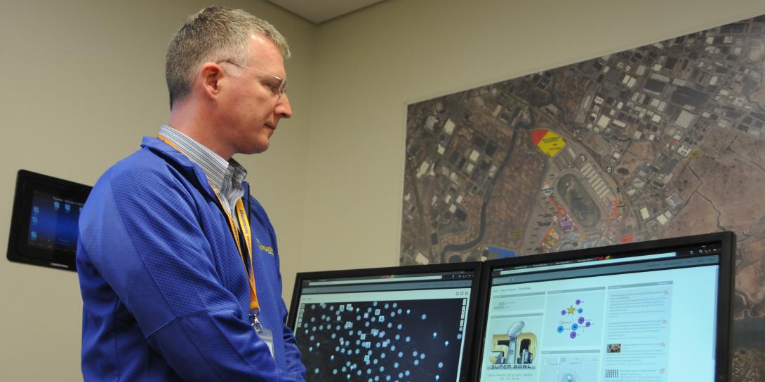 Rob Kerr, chief software architect for Haystax Technologies, demonstrates a predictive analytics tool used to deliver high fidelity threat assessments for Super Bowl 50.