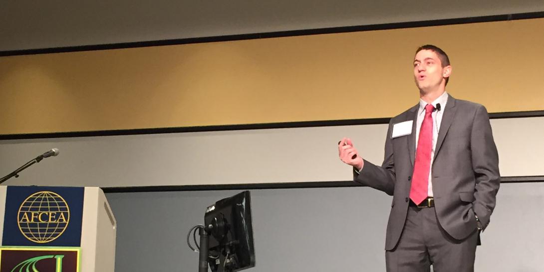 Paul Tilghman, program manager, Microsystems Office, DARPA, speaks at the AFCEA/GMU Critical Issues in C4I Symposium.